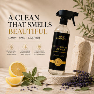Alise Edwards Multi-Purpose Cleaner bottle with lemon, sage, and lavender on a stone slab.