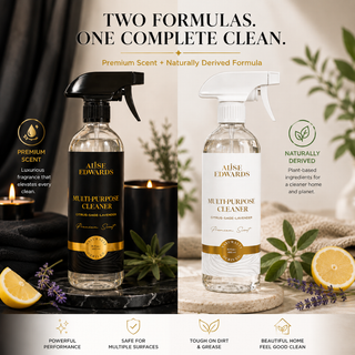 Two Alise Edwards Multi-Purpose Cleaner bottles styled with candles, lemon slices, and lavender.